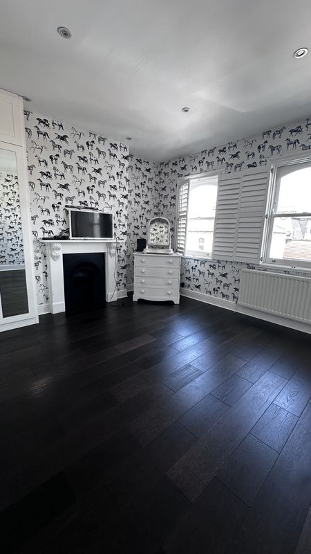 A top floor bedroom before the work