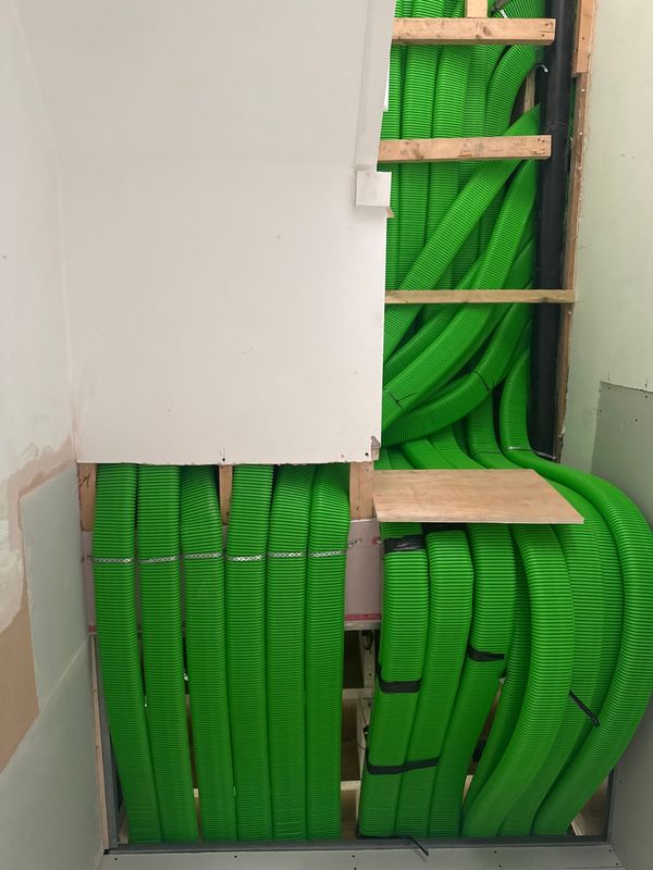 Ventilation ducts run up the house