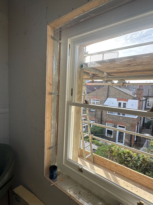 A new sash window, trimmed and ready for paint