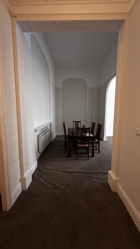 The arched dining recess before the work.