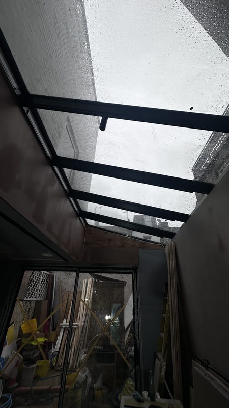 The glazed roof of the side return, fitted and sealed.
