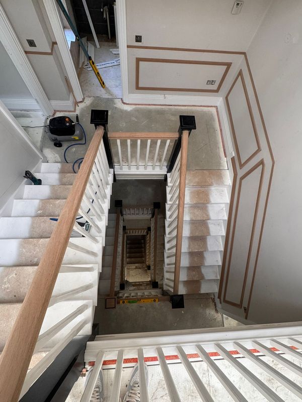 The stairwell, panelled floor by floor