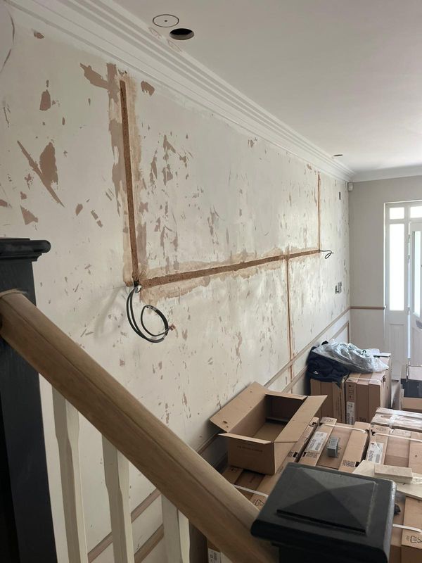 Panel mouldings marked out on the landing