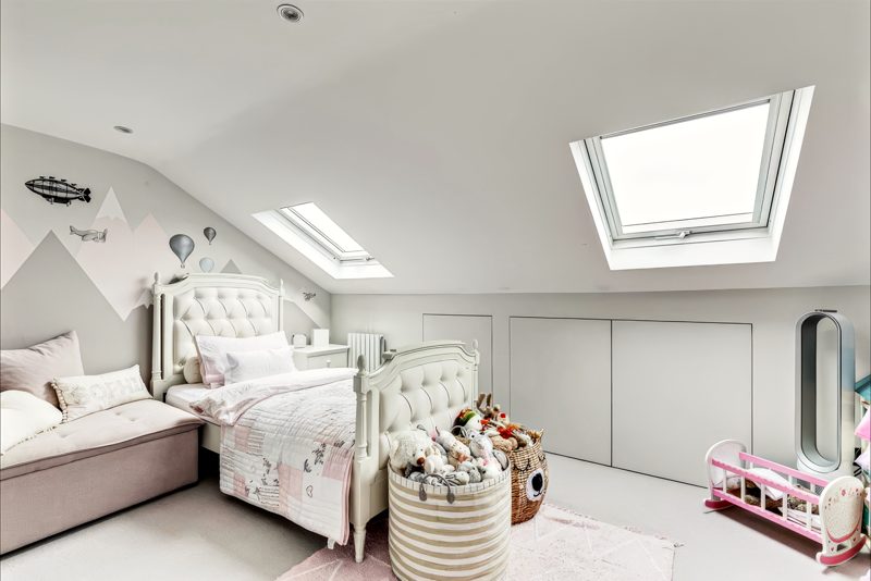 Child’s room under the roof, with two rooflights.