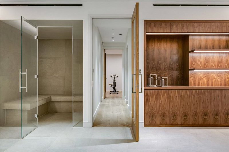 Steam room and walnut joinery on the lower leisure floor.